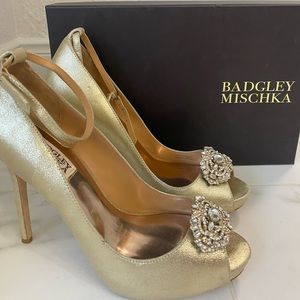 Size 8.5. Worn to try on in the house only.